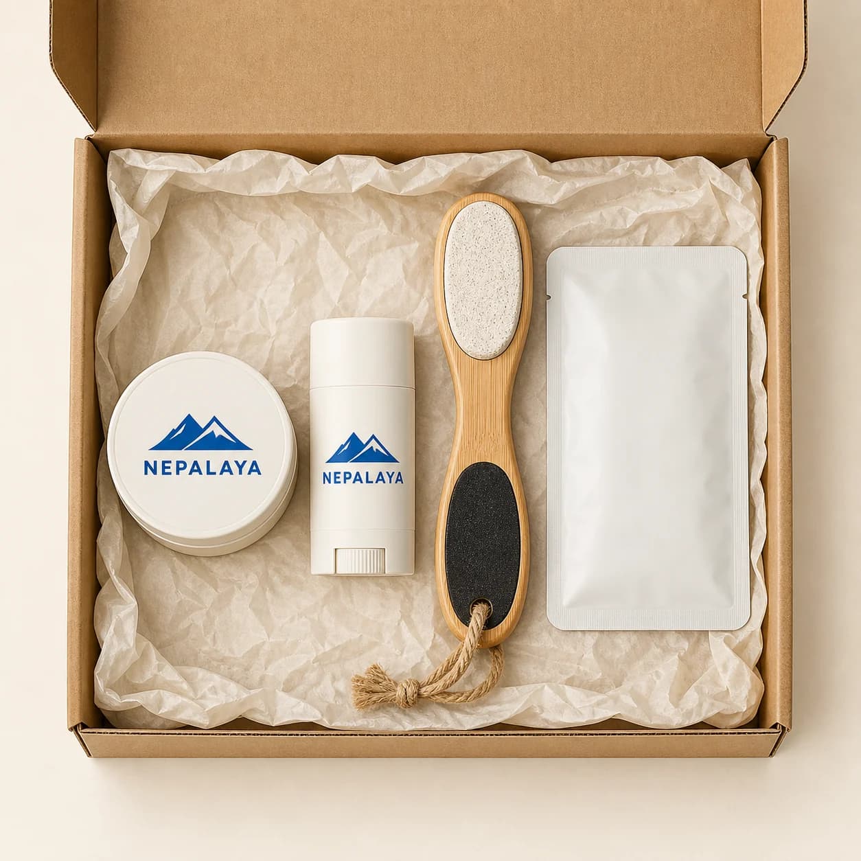 The Nepalaya Complete Pedicure Set laid out in a kraft gift box